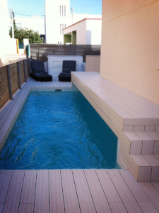 Swimming pool with bridge at family home